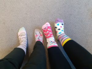 Image of two school nurses odd socks from last years odd socks day 
